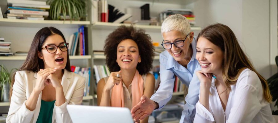 a group of female co worker taking Leadership Training for Women course