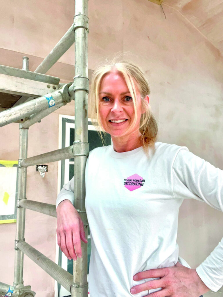 Sharon Norton smiling confidently as she reflects on her Women in Leadership experience and entrepreneurial success.